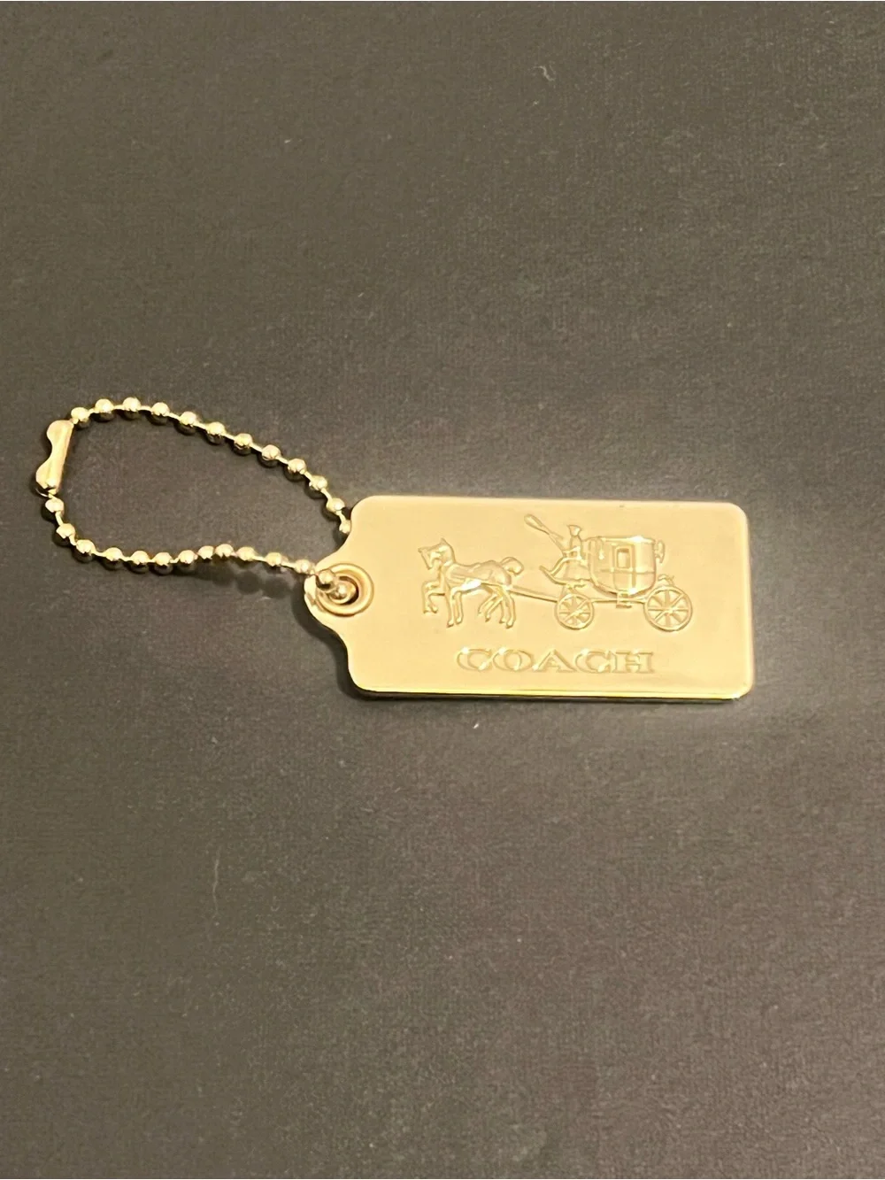 Rare Vintage Coach Gold Tone Embossed Horse & Carriage Dog-Tag Key Holder